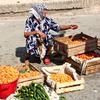 A fruit seller at market in Uzbekistan