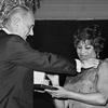 Opera singer Leontyne Price smiles while she is awarded the Presidential Medal of Freedom by President Lyndon Johnson