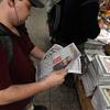 Brad Rousse, 26, buys several newspapers the day after bin Laden was killed. 