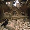 Vedran Smajlovic performs in 1992 in Sarajevo in the partially destroyed National Library
