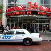 Extra police are outside of New York City movie theaters on opening night of 'The Dark Knight Rises.' 