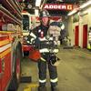 Firefighter Shane Clarke wearing almost 130 pounds of gear.