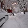 A single shoveler pits himself against the snow Thursday morning January 27, 2011