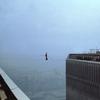 Philippe Petit walks between the two towers of the World Trade Center in 1974.