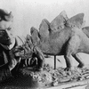 Charles R. Knight at work on a model of a stegosaurus in 1899