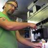 Doug Quint working inside the Big Gay Ice Cream Truck on October 29