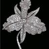 This platinum and diamond orchid brooch, designed by Van Cleef & Arpels in 1928, was featured in the Cooper-Hewitt's recent exhibition.