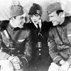 Charles 'Buddy' Rogers, Clara Bow, and Richard Arlen (left to right) on the set of 'Wings'.