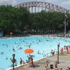 Large crowds flock to accomodatingly large Astoria Pool and its surrounding park in the summer months. 