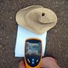 Stuck with an infrared thermometer, WNYC’s Beth Fertig got creative and pointed it at a piece of paper shielded by a hat when she went to Bensonhurst to take temperatures.