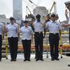 Coast Guard Petty Officers ecite the oath of enlistment at the World Trade Center ceremonial platform on May 26, 2011.