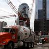 Concrete truck making a delivery at the transit hub at the World Trade Center work site.