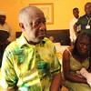 Ivory Coast strongman Laurent Gbagbo and his wife Simone sit on a bed at the Hotel du Golf in Abidjan after their arrest on April 11, 2011