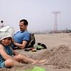 Young girl and her father at the Coney Island beach the Friday before Memorial Day.