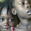 Children wait in line for medical care in Haiti