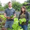 Caleb Leech and Ariel Nadelberg standing among the Brooklyn Botanic Garden's amaranth plants