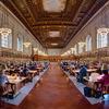 A panoramic view of the main branch of the Rose Main Reading Room at the New York Public Library.