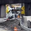A bike involved in a crash at the Lincoln Tunnel being towed