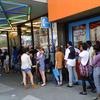 Prospective sales clerks line up for an advertised job opening at an American Apparel shop on Flatbush Ave. in Brooklyn