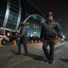 Police officers patrol outside Moscow's Domodedovo international airport on January 24, 2011, soon after an explosion.