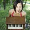 Phyllis Chen and her toy piano