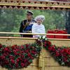 Queen Elizabeth and the Duke of Edinburgh onboard the Royal Barge to celebrate the Queen’s Diamond Jubilee at the River Pageant on the Thames River