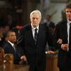 Senator Edward Kennedy's brother in law Sargent Shriver is escorted to his seat in the church by his son Anthony Kennedy Shriver (R)