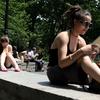 Reading in the sun on a lunch break in Union Square Park.