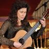 Grammy award-winning guitarist Sharon Isbin performs during a classical music workshop and concert November 4, 2009 in the East Room of the White House.