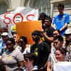 Students rally at City Hall to restore funding cuts to schools and summer youth programs.