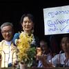 Aung San Suu Kyi addresses thousands of her supporters at her National League for Democracy headquarters on November 14, 2010 in Yangon, Burma