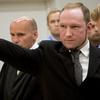 August 24, 2012 Self confessed mass murderer Anders Behring Breivik raising his fist in a right wing salute after being sentenced to 21 years in prison, in court room 250 at Oslo District Court.