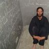 Matthew VanDyke at a Libyan Prison Cell