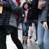 A crowd of high school students laugh as they walk to school on a Monday morning in Lower Manhattan.