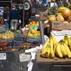 Stacks of fruit sit on a vendor's cart outside City Hall in lower Manhattan.
