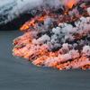 An aerial picture taken on September 14, 2014 shows lava flowing out of the Bardarbunga volcano in southeast Iceland.