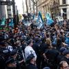  Protesters demanding economic and political changes to curb the effects of global warming clash with police as try to walk down Wall Street on September 22, 2014.
