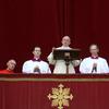 Pope Francis delivers his Christmas Day message from the central balcony of St Peter's Basilica on December 25, 2013 in Vatican City, Vatican.