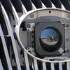 A camera peers out from the front grill of Google's self-driving car in Mountain View, California, on May 13, 2014. 