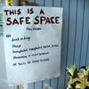 A sign posted at a safe space.