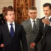 Syrian President Bashar Assad (R) receives Russian President Dmitry Medvedev (L) May 10, 2010 in Damascus, Syria. Assad uses connections with shell companies to secure his fortune.
