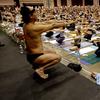 Bikram Choudhury, front, founder of the Yoga College of India and creator and producer of Yoga Expo 2003, leads what organizers hope will be the world's largest yoga class.