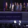 President-elect Donald Trump, left, followed by his family are photographed by members of the media as they arrive at his election night rally, Wednesday, Nov. 9, 2016, in New York. 