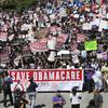 Hundreds of people march through downtown Los Angeles protesting President Donald Trump's plan to dismantle the Affordable Care Act, his predecessor's signature health care law, in March, 2017.