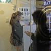 People use a Bitcoin ATM in Hong Kong in December, 2017.