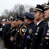 Asian-American police officers from across the country attend the funeral of Wenjian Liu in Brooklyn on Jan. 4, 2014.