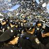 The June 2014 class of NYPD cadets holding a graduation ceremony at Madison Square Garden. The 610 graduates are 51% minority, 20% women, and come from 47 countries.