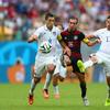 Philipp Lahm of Germany is challenged by Clint Dempsey (L) and Alejandro Bedoya of the U.S. during the 2014 FIFA World Cup Brazil group G match at Arena Pernambuco on June 26, 2014 in Recife, Brazil.