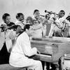 Duke Ellington (seated) and members of his famous Ellington Orchestra.