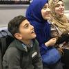 Syrian refugees on their first subway ride in New York City. 